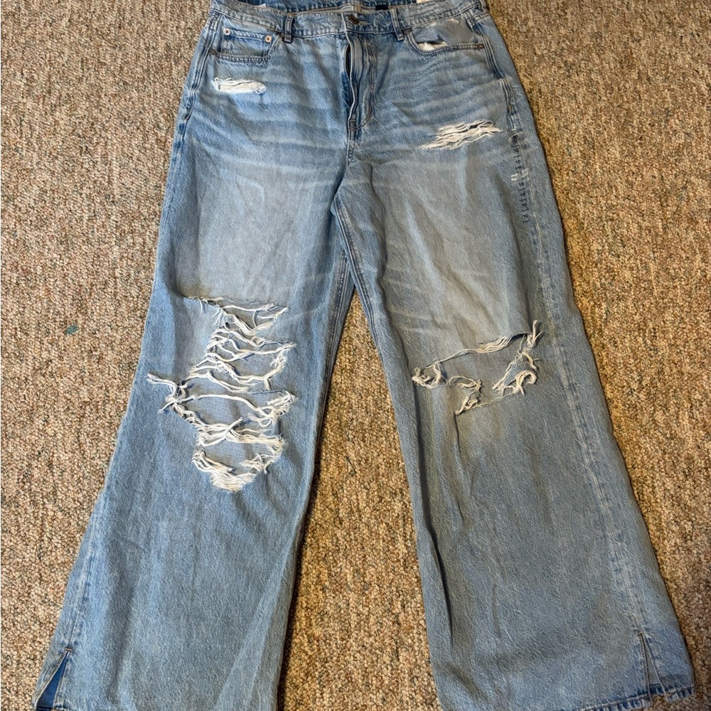 Distressed Blue Denim Jeans